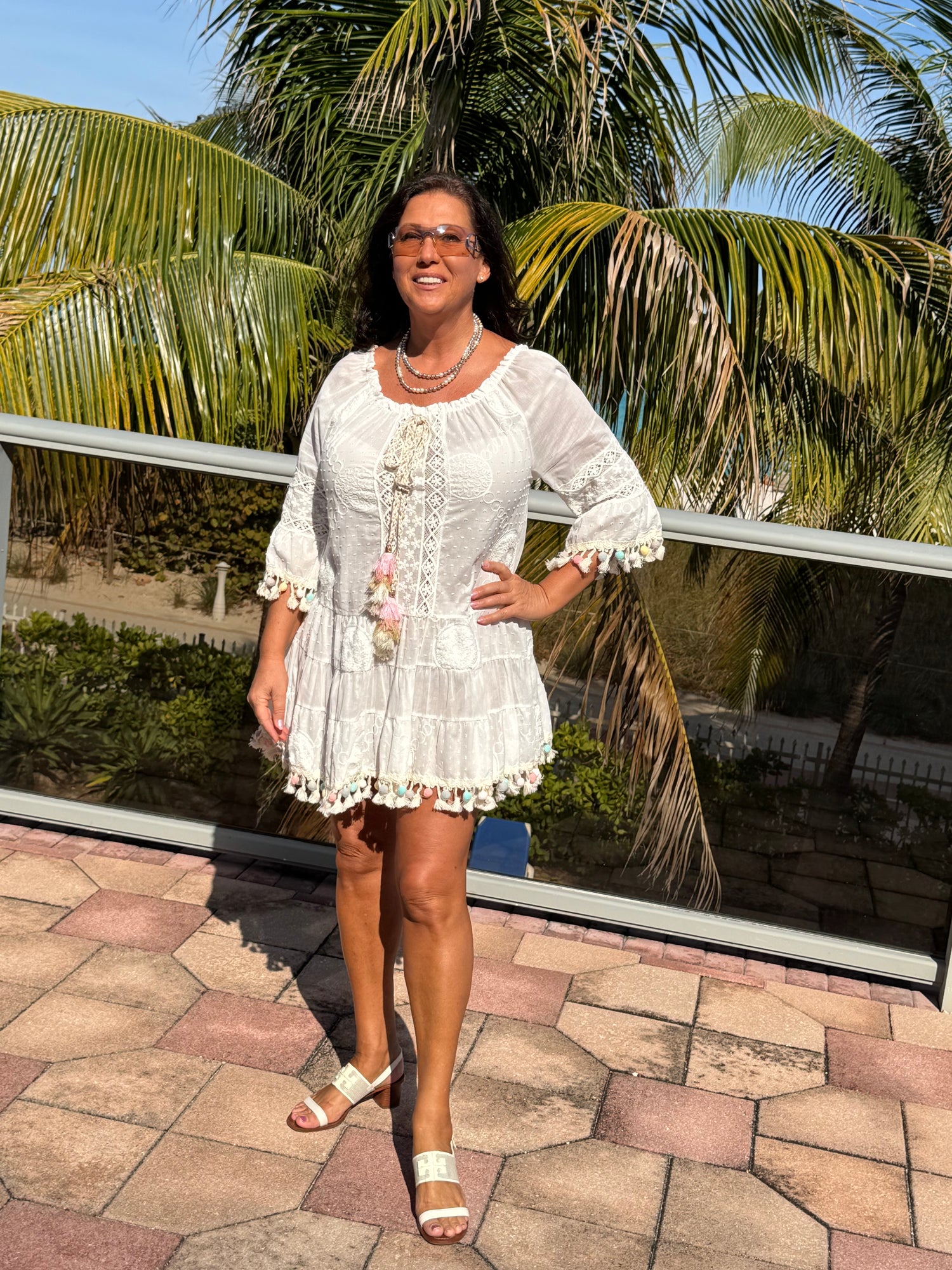 Style 1110 white summer dress with rainbow pom pom
