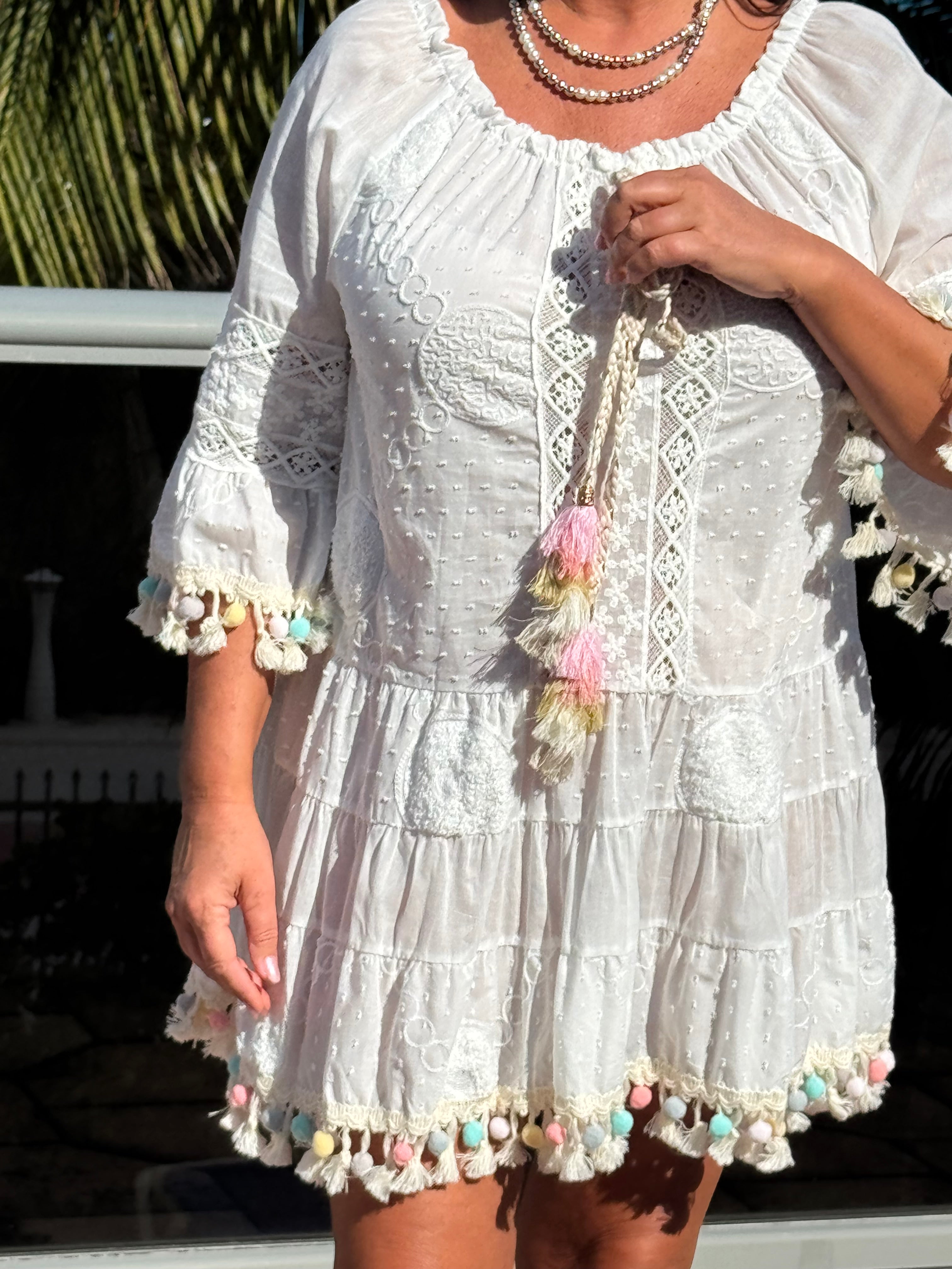 Style 1110 white summer dress with rainbow pom pom